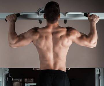 Tractions : le meilleur exercice pour le dos en musculation - DRAVEL